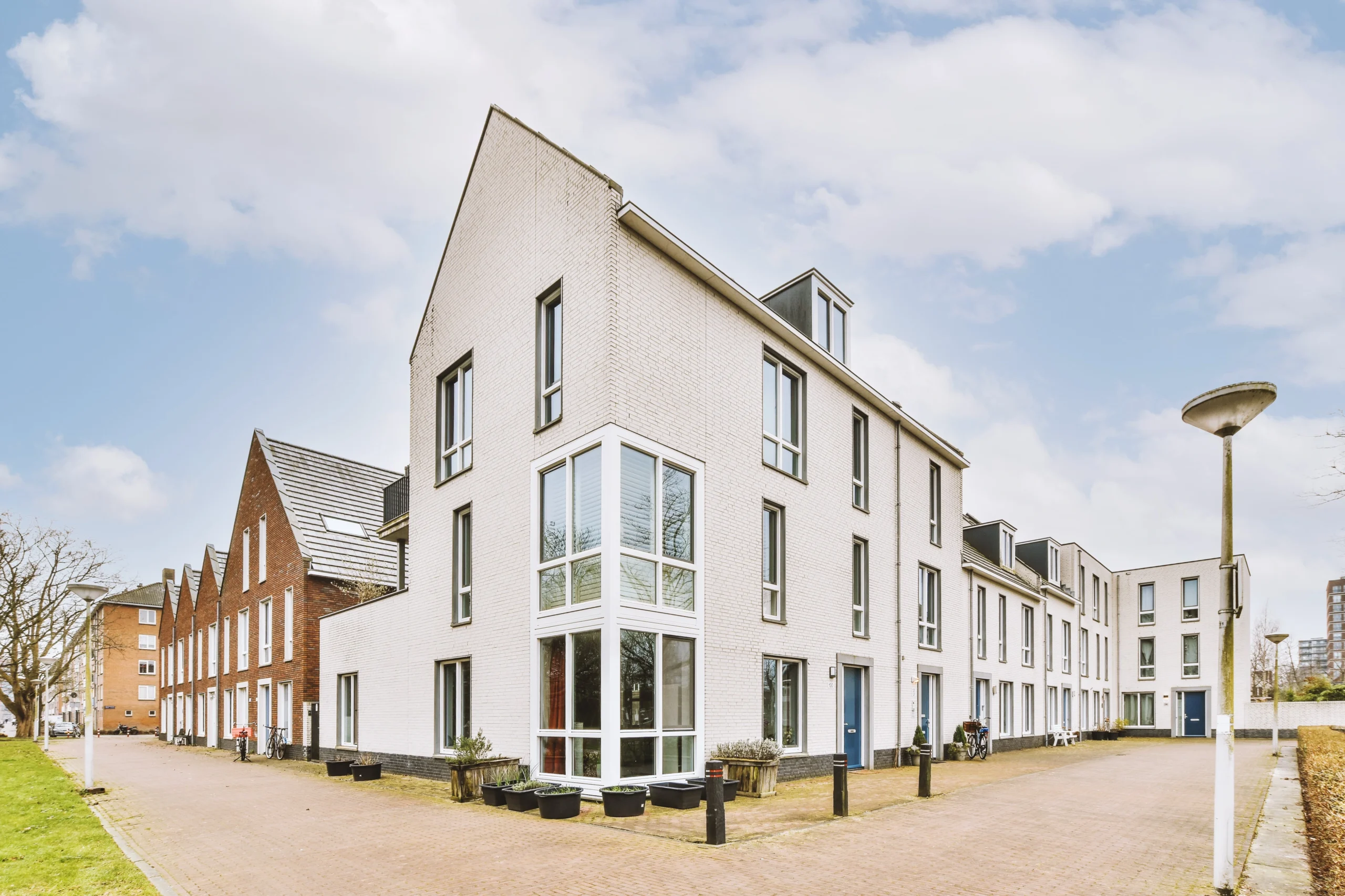 the-facade-of-a-brick-building-with-wooden-door-2025-02-09-23-39-10-utc-min
